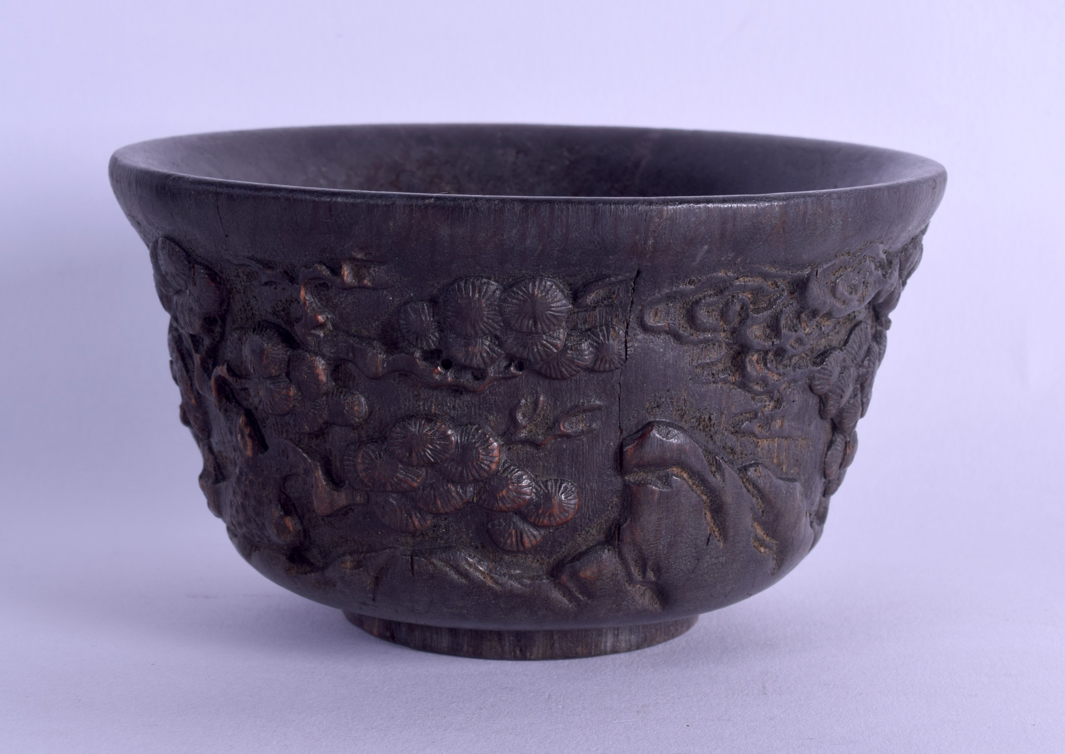 A CHINESE CARVED HARDWOOD CIRCULAR BOWL bearing Kangxi marks to base, decorated with flowering - Image 2 of 3