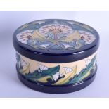 A MOORCROFT 'SEEDS' LIDDED BOX AND COVER designed by Vicky Lovatt. 16 cm diameter.