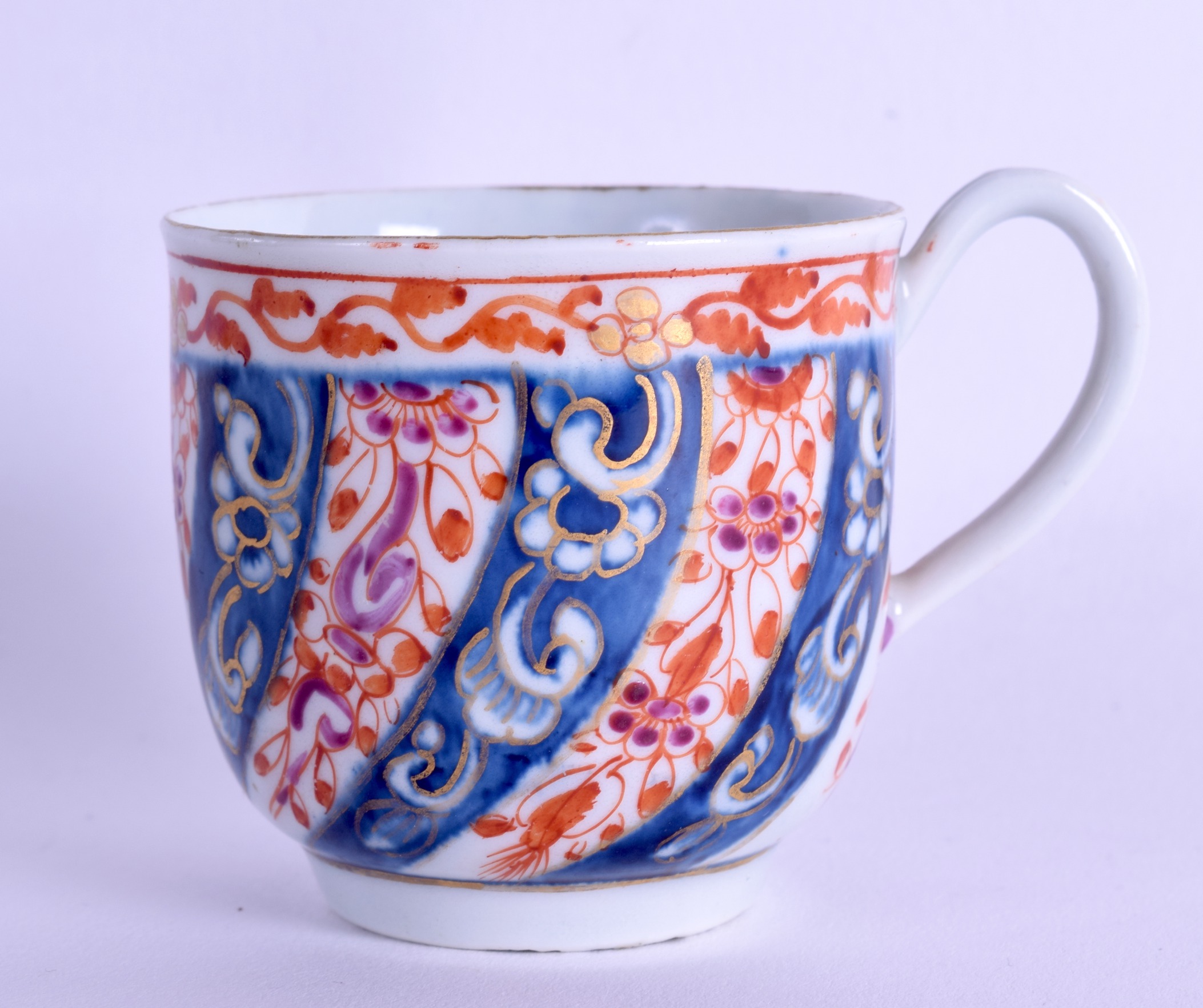 18th c. Worcester workman's mark period coffee cup painted with the Queen Charlotte pattern, this is