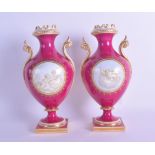 Mid 19th c. Coalport pair of vases painted en-grisaille with cherubs in Watteau style on a crimson