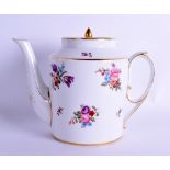 Early 19th c. Paris porcelain teapot and cover of barrel shape finely painted with floral sprays.