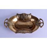 AN ART NOUVEAU BRASS TWIN HANDLED DISH decorated with acanthus and motifs. 31 cm wide.