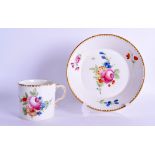 18th c. Continental coffee can and saucer painted with a central rose and scattered floral spray,