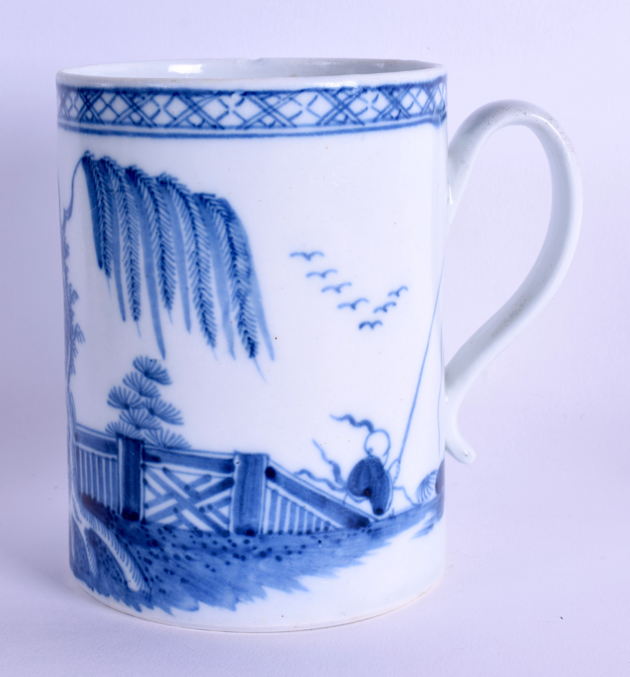 18th c. mug painted in under glaze blue with a fisherman beside a fence and willow probably Chaffers
