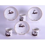 Early 19th c. set of three Paris porcelain coffee can and saucers en-grisaille with landscape and