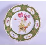 Royal Worcester plate painted with wild flowers to the centre and in gilt panel cartouches