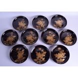 A GROUP OF TEN LATE 19TH CENTURY JAPANESE MEIJI PERIOD LACQUERED DISHES decorated with gold foliage.