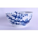 18th c. Worcester bowl painted with the Prunus Root pattern in under glaze blue, workman's mark.