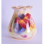 Royal Worcester vase with pie crust rim painted with autumnal leaves and berries by Kitty Blake