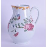 An 18th c. Liverpool sparrow beak jug painted in famille rose style under a bright yellow border.