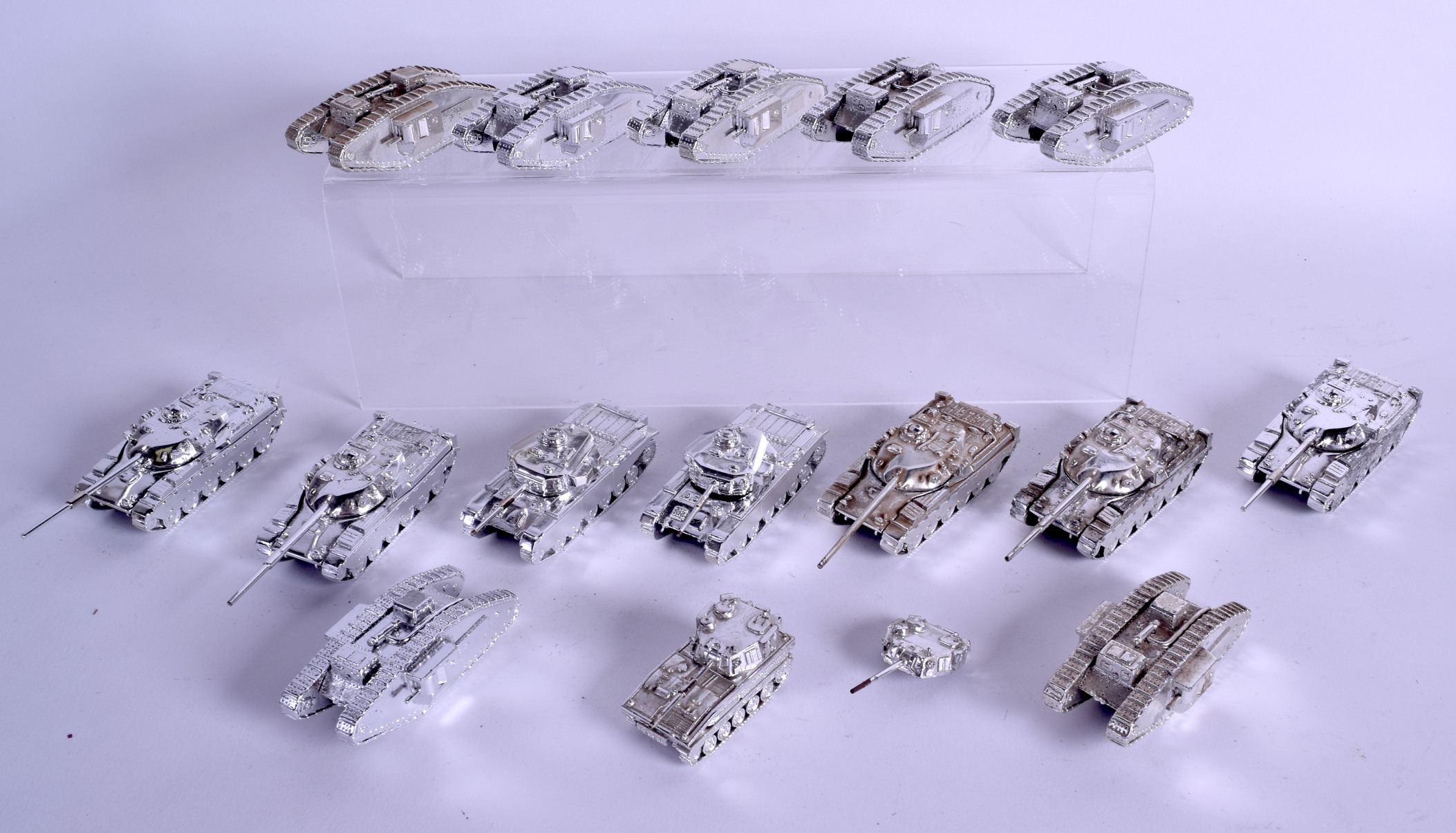 AN UNUSUAL SET OF FIFTEEN ELECTROFORM SILVER MODELS OF TANKS