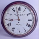 A MAHOGANY HANGING WALL CLOCK signed S.I.R John Walker Ltd, 63 New Bond Street. 41 cm wide.