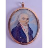 AN 18TH/19TH CENTURY ENGLISH PAINTED IVORY PORTRAIT MINIATURE depicting a male wearing a blue