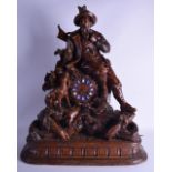 A VERY LARGE 19TH CENTURY BAVARIAN BLACK FOREST MUSICAL MANTEL CLOCK modelled as a male seated