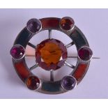 A LATE VICTORIAN SCOTTISH SILVER AGATE AND GEM STONE BROOCH. 5 cm diameter.