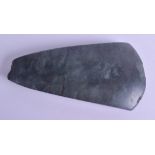 A NEW ZEALAND MAORI CARVED JADE AXE HEAD TOOL. 7 cm x 17 cm.