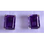 A PAIR OF SILVER SQUARE CUT AMETHYST EARRINGS.