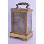 A LARGE 19TH CENTURY FRENCH BRASS REPEATER CARRIAGE CLOCK with dual silvered dial, the case