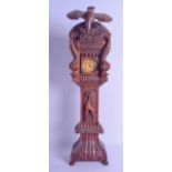 AN UNUSUAL LATE 19TH CENTURY BAVARIAN BLACK FOREST CARVED MANTEL CLOCK surmounted with a hawk over