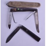 A VINTAGE CARVED HORN AND STEEL FOLDING KNIFE together with a smaller similar knife. (2)