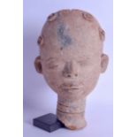 AN UNUSUAL ANTIQUE CARVED AFRICAN TRIBAL TERRACOTTA HEAD possibly Koma, with unusually double