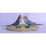 AN ART DECO COLD PAINTED BRONZE DOUBLE BIRD ONYX ASHTRAY modelled in opposing stances. 31 cm wide.