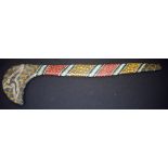 AN AUSTRALIAN WOODEN BIRD HEAD CLUB, with applied beadwork decoration. 71 cm.