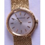 A LOVELY LADIES 18CT YELLOW GOLD JAEGER LE COULTRE WRISTWATCH with circular silvered dial and gold