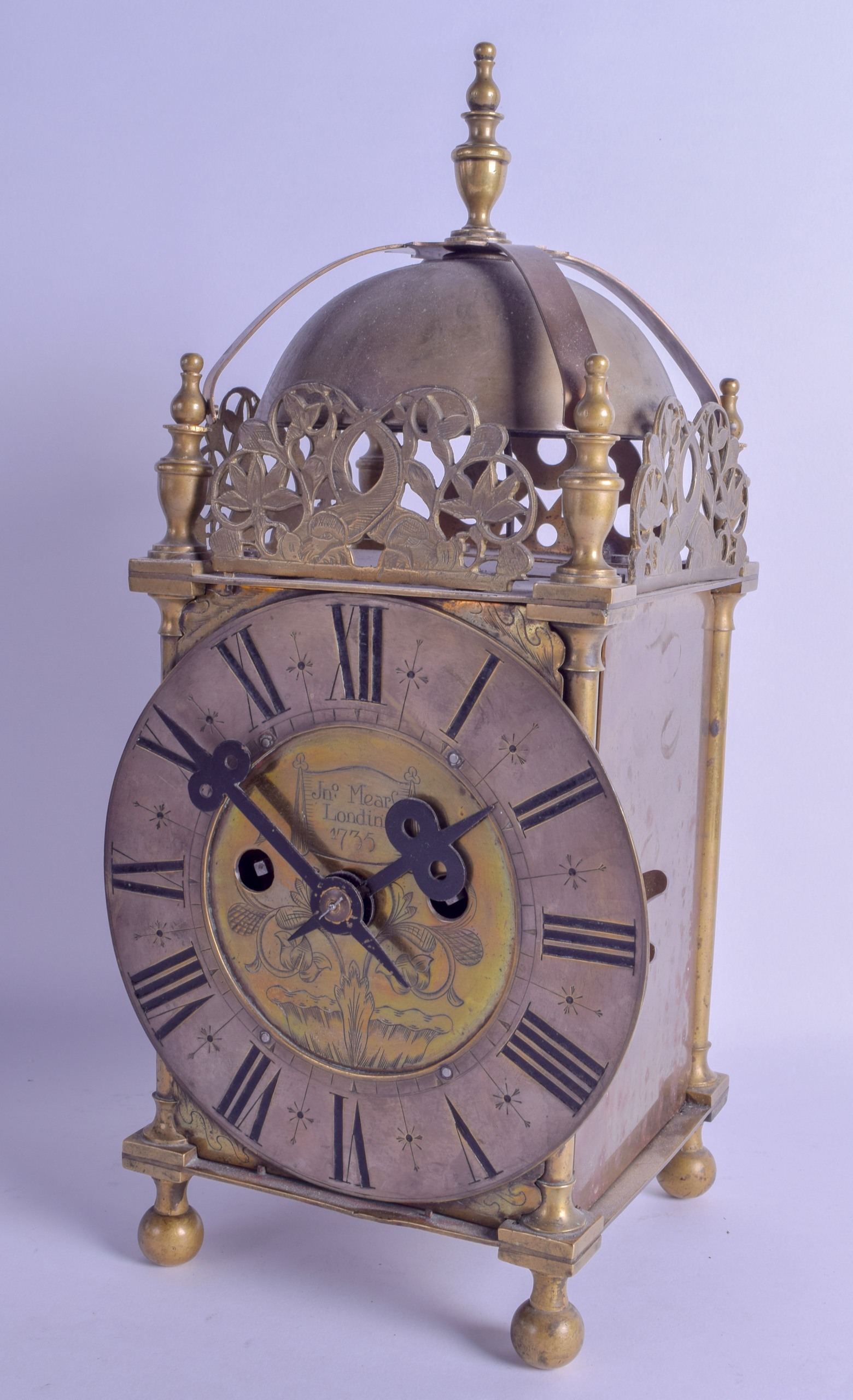 AN ANTIQUE BRASS LANTERN CLOCK signed John Mears of London 1735, engraved with foliage and vines. 38