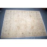 AN AFGHAN ZIEGLER RUG, of muted colours. 170 cm x 128 cm.