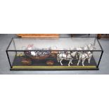 A LARGE CASED HORSE DRAWN CARRIAGE. 138 cm wide.