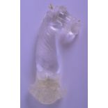 A MIDDLE EASTERN PERSIAN CARVED ROCK CRYSTAL DAGGER HANDLE possibly 19th century, in the form of a