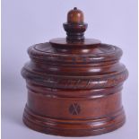 A GOOD 19TH CENTURY TURNED TREEN INLAID TOBACCO JAR with internal press, the top set with a star