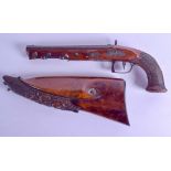 AN UNUSUAL MID 19TH CENTURY MIDDLE EUROPEAN WALNUT PISTOL with unusual removable buttstock, carved