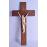 AN 18TH CENTURY CARVED EUROPEAN IVORY CRUCIFIX modelled upon a later wooden cross. Ivory 23 cm x