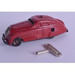 A RARE SCHUCO 'BLOW START' KOMMANDO ANNO 2000 WIND UP CAR. 14 cm long.