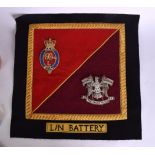 AN EMBROIDERED L/N BATTERY FLAG. 40 cm square.