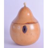 A REGENCY CARVED FRUITWOOD TEA CADDY in the form a pear, with bone finial. 13.5 cm high.
