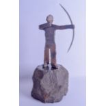 A STYLISH 1950S CAST IRON AND POLISHED STONE FIGURE OF AN ARCHER modelled standing upon a