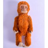 A RARE SCHUCO SCENT BOTTLE AND STOPPER unusually in the form of a red monkey. 11.75 cm high.