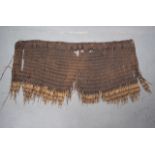 AN UNUSUAL 19TH CENTURY NEW ZEALAND MAORI TRIBAL GRASS SKIRT. 116 cm x 55 cm.