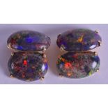 A FINE PAIR OF 14CT YELLOW GOLD FIRE OPAL CUFFLINKS. 13.7 grams overall. Opal 1.25 cm x 2 cm.