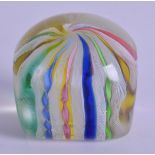 A STYLISH EUROPEAN PAPERWEIGHT with spiral twist multi coloured interior. 6 cm x 6.5 cm.