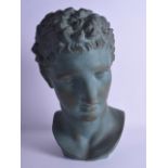 A GOOD GREEN PAINTED TERRACOTTA BUST OF A ROMAN MALE After the Antique, modelled upon an ebonised