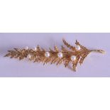 A 9CT GOLD AND SEED PEARL NATURALISTIC BROOCH. 6.3 grams. 6.5 cm long.