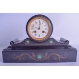 A LATE VICTORIAN BLACK SLATE AND MALACHITE MANTEL CLOCK of scrolling form, decorated with gilt