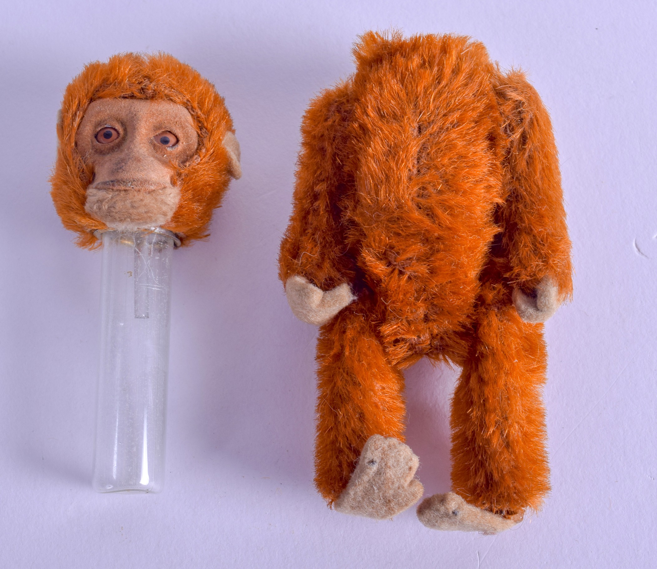A RARE SCHUCO SCENT BOTTLE AND STOPPER unusually in the form of a red monkey. 11.75 cm high. - Image 3 of 3