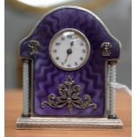 A FINE EARLY 20TH CENTURY SWISS SILVER AND ENAMEL MINIATURE CLOCK with rotating white enamel pillars