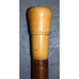 AN EARLY 20TH CENTURY IVORY TOP WALKING CANE, of plain form. 86 cm long.