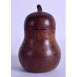 A 19TH CENTURY CARVED FRUITWOOD TEA CADDY AND COVER of naturalistic form. 15 cm high.